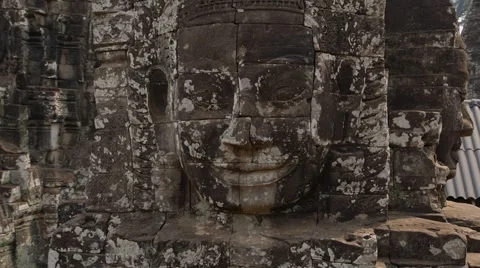 Stone head in the ancient temple of Bayon in Cambodia Stock Footage 49407852