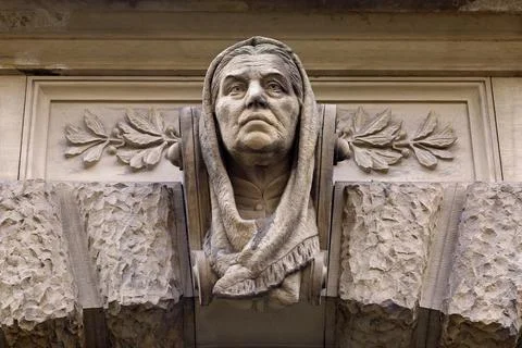 Stone head of a house facade Stock Photos