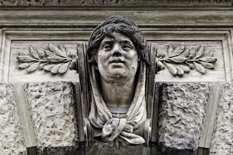 Stone head of a house facade Stock Photos