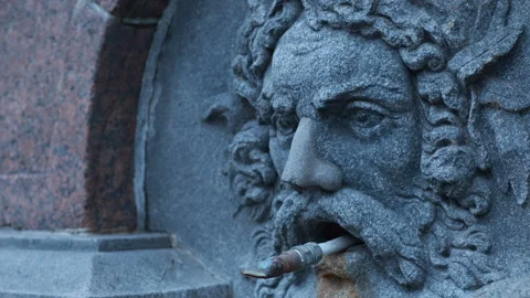 Stone head of a man ancient parched fountain Stock Footage 190610427