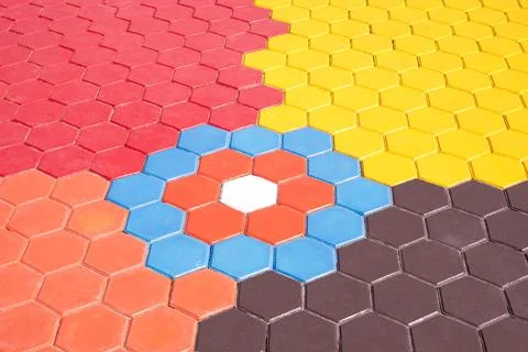 Stone hexagon brick blocks pavement floor background with colorful geometri.. Stock Photos