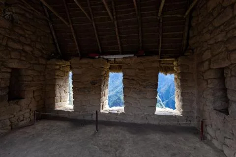 Stone house with windows, inside view, Machu Picchu Peru. Stock Photos