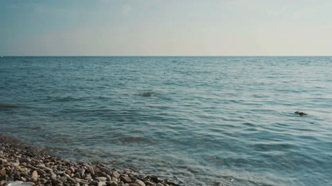 Stone jumping in the sea Stock Footage 94928959