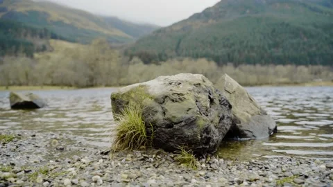 Stone in lake Stock Footage 167645622