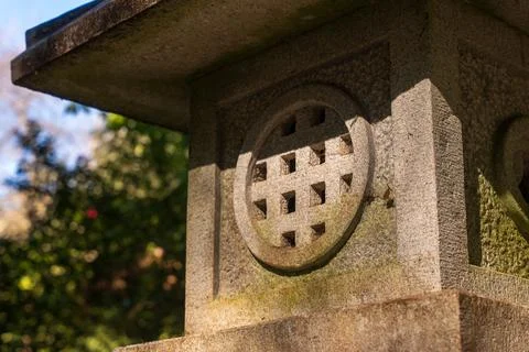 Stone lantern with circular lattice in Monte Palace Tropical Garden Stock-Fotos