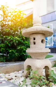 A stone Lantern in garden Stock Photos