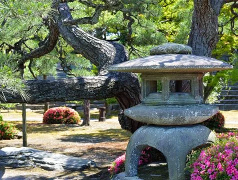 Stone lantern in garden Stock Photos