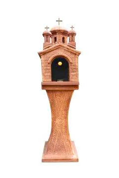 Stone lantern in the shape of a monastery as garden decoration on a white 스톡 사진