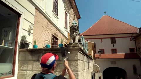 Stone lion in front of the Stone Gate  in the lower part of the city of Zagreb Stock Footage 203506809