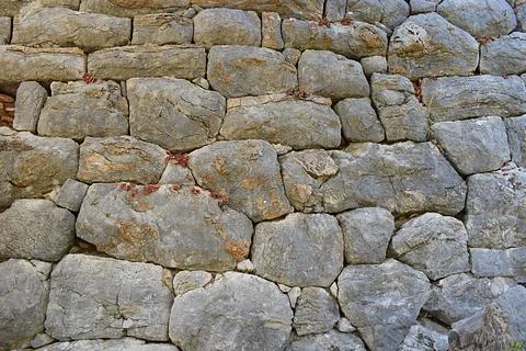 The stone masonry of the protective wall of the ancient city. Stock-Fotos