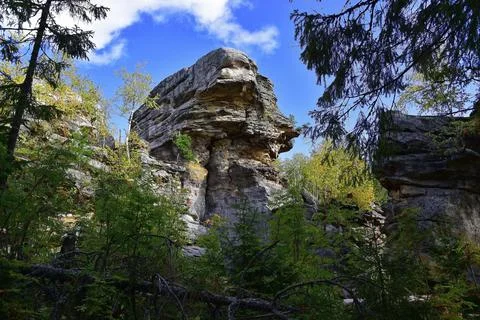 Stone megalith Feathered Guard is the second largest peak in the Kamenny Goro Stock Photos