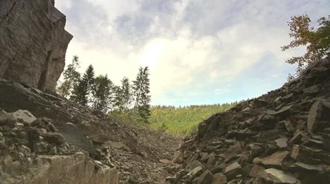 Stone mine with blue sky and clouds Stock Footage 44391329