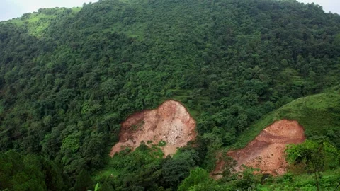 Stone mining destroying green landscape in Himalayas Stock Footage 316997217