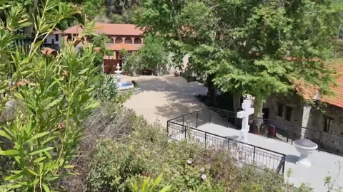 Stone monastery amid pine forest in Cyprus mountains Stock Footage 328097887