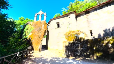 Stone Monastery and Bell Gable at San Pedro de Rocas in Esgos Stock-Footage 343747730