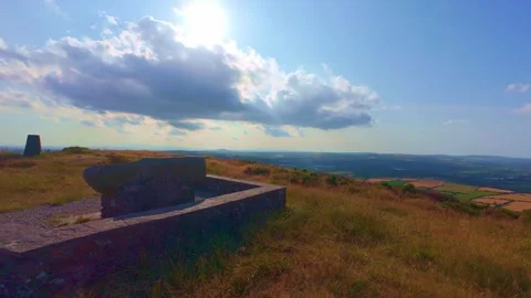 Stone monument triangulation pillar on hill peak in Ireland Stock Footage 340435867
