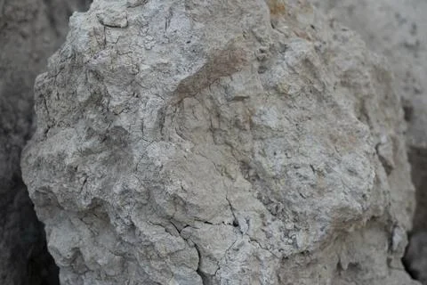 Stone mountain texture. A close up view of a steep stone quarry face showin.. Stock Photos