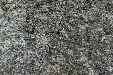 Stone mountain texture. A close up view of a steep stone quarry face showin.. Stock Photos