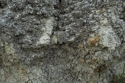Stone mountain texture. A close up view of a steep stone quarry face showin.. Stock Photos