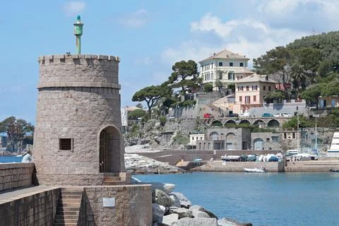 Stone old lighthouse in seafront town of Recco, Liguria. Nature, tourism and Stock Photos