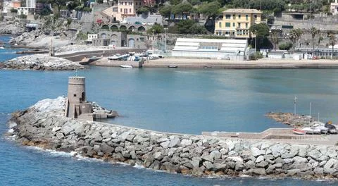 Stone old lighthouse in seafront town of Recco, Liguria. Nature, tourism and Stock Photos