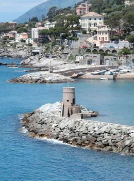 Stone old lighthouse in seafront town of Recco, Liguria. Nature, tourism and Stock Photos