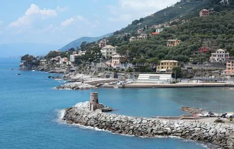 Stone old lighthouse in seafront town of Recco, Liguria. Nature, tourism and Stock Photos