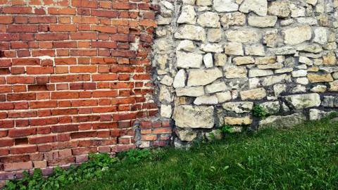 Stone old wall from huge blocks. Background of stones. Beautiful textured Stock Photos