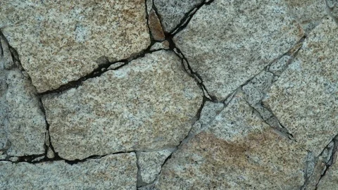 Stone or granite wall. Background or backdrop. Stock Footage 121528506