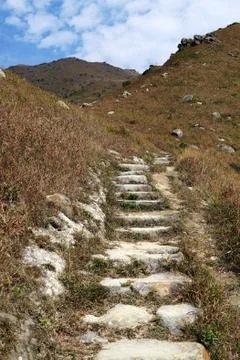 Stone path in the mountains Stock Photos