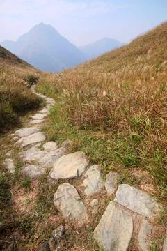 Stone path in the mountains Stock Photos