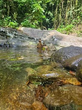 Stone path in a stream Stock Photos