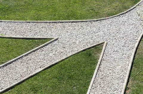 Stone paths on the green grass Stock Photos