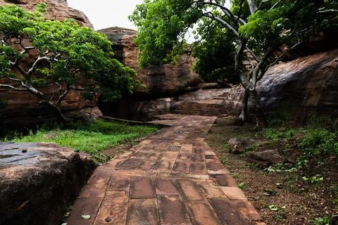 Stone pathway built between hills Stock Photos