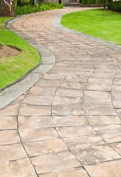 Stone pathway in the garden. Stock Photos
