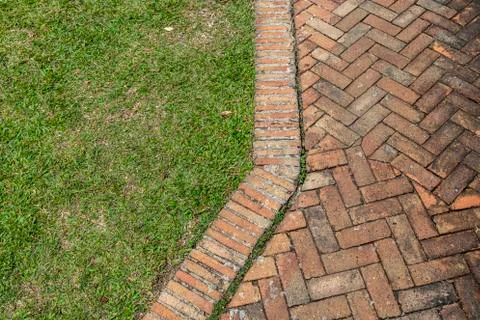 Stone pathway with grass Stock Photos
