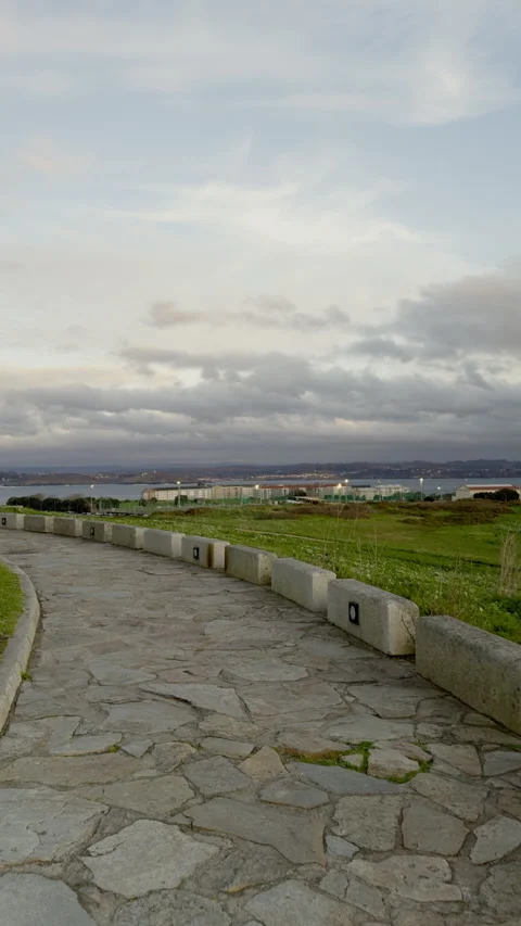 Stone Pathway Leading to Coastal View Stock Footage 276954124