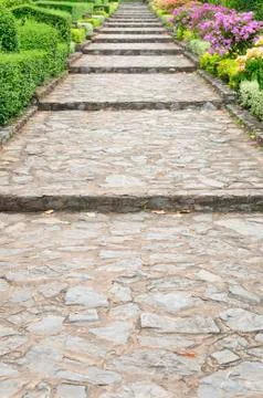 Stone pathway pass through a garden Stock-Fotos