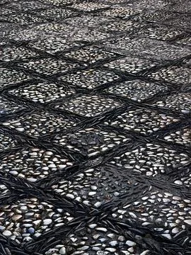 Stone Pattern On A Granada Sidewalk Foto stock