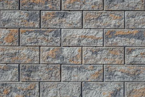 Stone patterned rectangular shape tiles aligned, exterior fence brick decor.. Foto stock