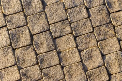 Stone paved path, diagonal direction with side light Stock Photos