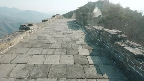 Stone-Paved Walkway and Weathered Ramparts Along a Mountain Ridge of the Great Stock Footage 342419117