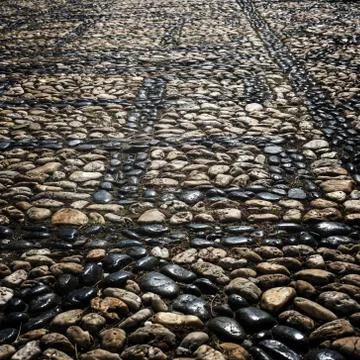 Stone pavement, abstract background. Stock Photos