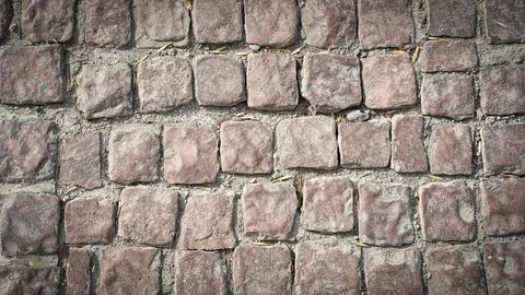 Stone pavement texture. Abstract background of cobblestone pavement Foto stock