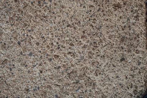 Stone Pavement Texture with Pebble Inlay and Concrete Tiles Background Stockfoto's