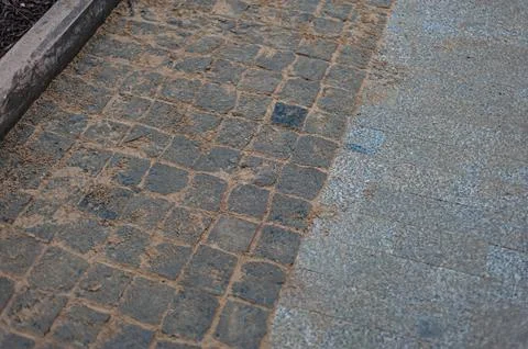 Stone pavement texture in perspective road surface Stock Photos