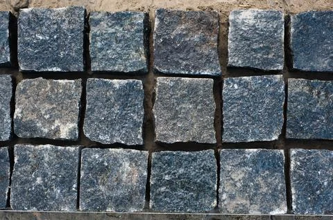 Stone pavement texture in perspective road surface Stock Photos