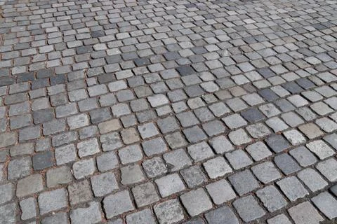 Stone paving background - granite cobblestone pattern in Nuremberg, Germany. Stock Photos