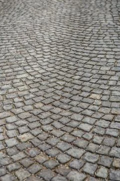 Stone paving texture. Abstract structured background. Stock Photos