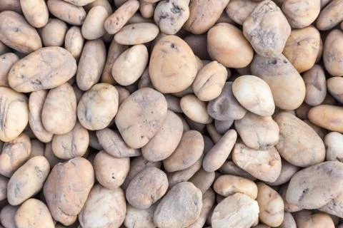Stone pebbles texture or stone pebbles background for design. Stock Photos